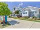 Community building with white exterior and stone accents plus manicured landscaping at 6036 Balance Ct, Raleigh, NC 27616