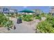 View of the community garden with raised garden beds and a shelter at 6036 Balance Ct, Raleigh, NC 27616