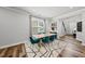 Bright dining room features natural light, hardwood flooring, and modern decor at 6036 Balance Ct, Raleigh, NC 27616