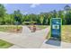 Entrance to River Bend Park featuring a playground and lush greenery at 6036 Balance Ct, Raleigh, NC 27616