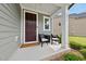 Inviting front porch featuring stylish seating and a welcoming entryway with attractive design at 6036 Balance Ct, Raleigh, NC 27616