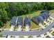 Street view of modern homes with front yard landscaping and attached garages at 6036 Balance Ct, Raleigh, NC 27616