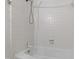 Bathroom featuring a tiled shower-tub combo at 636 Pendleton Lake Rd, Raleigh, NC 27614