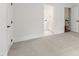 Inviting bedroom featuring doors and doorway offering seamless flow to adjacent spaces at 636 Pendleton Lake Rd, Raleigh, NC 27614