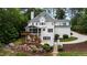 Beautiful two-story home with a screened porch and a well-manicured lawn at 636 Pendleton Lake Rd, Raleigh, NC 27614
