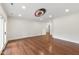Spacious living room with hardwood floors and unique ceiling design at 636 Pendleton Lake Rd, Raleigh, NC 27614