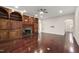 Spacious living room with beautiful built-ins, fireplace, and hardwood floors at 636 Pendleton Lake Rd, Raleigh, NC 27614