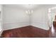 Elegant living room with beautiful trim and chandelier at 636 Pendleton Lake Rd, Raleigh, NC 27614