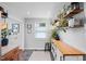 Kitchen featuring open shelving and stainless steel appliances at 729 Mial St, Raleigh, NC 27608