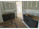Bathroom with gray cabinets and hardware being installed at 79 Oldham Estate Dr, Chapel Hill, NC 27517
