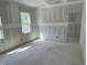 Spacious bedroom filled with natural light from the large windows at 79 Oldham Estate Dr, Chapel Hill, NC 27517