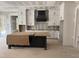 Open kitchen featuring white cabinets and a large island at 79 Oldham Estate Dr, Chapel Hill, NC 27517