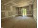 Bright room featuring drywall and access to the porch at 79 Oldham Estate Dr, Chapel Hill, NC 27517