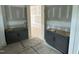Grey shaker cabinets and countertop vanity space in a new bathroom at 79 Oldham Estate Dr, Chapel Hill, NC 27517