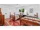 Charming bedroom with twin beds, colorful bedding, and natural light from the window, perfect for children at 800 Shady Lawn Rd, Chapel Hill, NC 27514