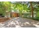Charming single-story home featuring a gravel driveway and well maintained landscaping at 800 Shady Lawn Rd, Chapel Hill, NC 27514
