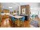 Modern kitchen with a large island, light wood cabinets, and updated appliances at 800 Shady Lawn Rd, Chapel Hill, NC 27514