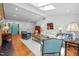 Inviting living room with skylights, brick fireplace, and stylish decor at 800 Shady Lawn Rd, Chapel Hill, NC 27514