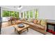Comfortable living room with large windows and an open view into the dining room at 800 Shady Lawn Rd, Chapel Hill, NC 27514