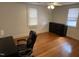Bedroom featuring hardwood floors, natural light, a ceiling fan and a dresser at 803 W Club Blvd, Durham, NC 27701