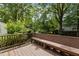 Wooden deck with bench and wooden railings, perfect for enjoying the outdoors at 803 W Club Blvd, Durham, NC 27701