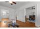 Open-concept dining room with hardwood floors, neutral walls, and natural light, creating a welcoming and spacious atmosphere at 803 W Club Blvd, Durham, NC 27701