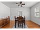 Dining room with hardwood floors and natural light, creating a warm and inviting space at 803 W Club Blvd, Durham, NC 27701