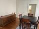 Traditional dining room with hardwood floors and classic furniture at 803 W Club Blvd, Durham, NC 27701