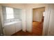 Convenient laundry area with a washer and dryer unit, and doorway leading into living area at 803 W Club Blvd, Durham, NC 27701