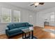 Living room with hardwood floors, neutral walls, and natural light, perfect for a cozy and bright atmosphere at 803 W Club Blvd, Durham, NC 27701