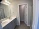 Bathroom with a double vanity and enclosed shower at 909 Clearhaven Ln # 909, Fuquay Varina, NC 27526