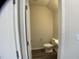 Cozy half-bath with modern toilet and vanity at 909 Clearhaven Ln # 909, Fuquay Varina, NC 27526