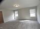 Bedroom with carpet and natural light coming from the windows at 909 Clearhaven Ln # 909, Fuquay Varina, NC 27526