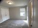 Cozy bedroom with natural light, carpeted floors and closet at 909 Clearhaven Ln # 909, Fuquay Varina, NC 27526