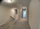 Upstairs hallway with carpeted floor and easy access to rooms at 909 Clearhaven Ln # 909, Fuquay Varina, NC 27526