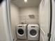 Bright laundry room with modern washer and dryer machines at 909 Clearhaven Ln # 909, Fuquay Varina, NC 27526