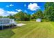 A backyard area featuring the deck and a shed at 101 Kristina Dr, Selma, NC 27576