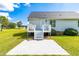 A back patio and steps lead to the backyard at 101 Kristina Dr, Selma, NC 27576
