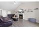 Comfortable living room with cozy fireplace, plush seating, and a view of the vaulted ceiling at 101 Kristina Dr, Selma, NC 27576