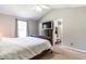 Comfortable main bedroom with neutral walls, vaulted ceilings and ensuite bathroom at 101 Kristina Dr, Selma, NC 27576