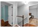 Hallway with hardwood floors and views to another bedroom at 102 Mel Oak Dr, Chapel Hill, NC 27516