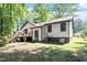 Rear exterior view of home with back porch at 103 Castill Pl, Garner, NC 27529