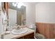 Bathroom featuring a vanity sink, mirror, and toilet at 103 Castill Pl, Garner, NC 27529