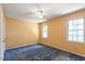 Bedroom featuring a ceiling fan and carpet floors at 103 Castill Pl, Garner, NC 27529