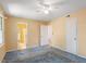 Bedroom featuring a ceiling fan, carpet floors, and bathroom access at 103 Castill Pl, Garner, NC 27529