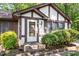 Charming home featuring a tidy front entrance with brick steps and well-maintained landscaping at 103 Castill Pl, Garner, NC 27529