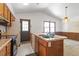 Kitchen featuring wood cabinets and a full appliance suite at 103 Castill Pl, Garner, NC 27529