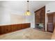 Living room featuring brick fireplace and access to other rooms at 103 Castill Pl, Garner, NC 27529