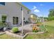 Beautiful backyard featuring a patio, fire pit, and manicured landscaping, perfect for outdoor gatherings at 106 Elmsford St, Durham, NC 27703