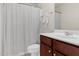 Clean bathroom with a shower-tub combo, toilet, and vanity with storage, providing a functional and well-maintained space at 106 Elmsford St, Durham, NC 27703